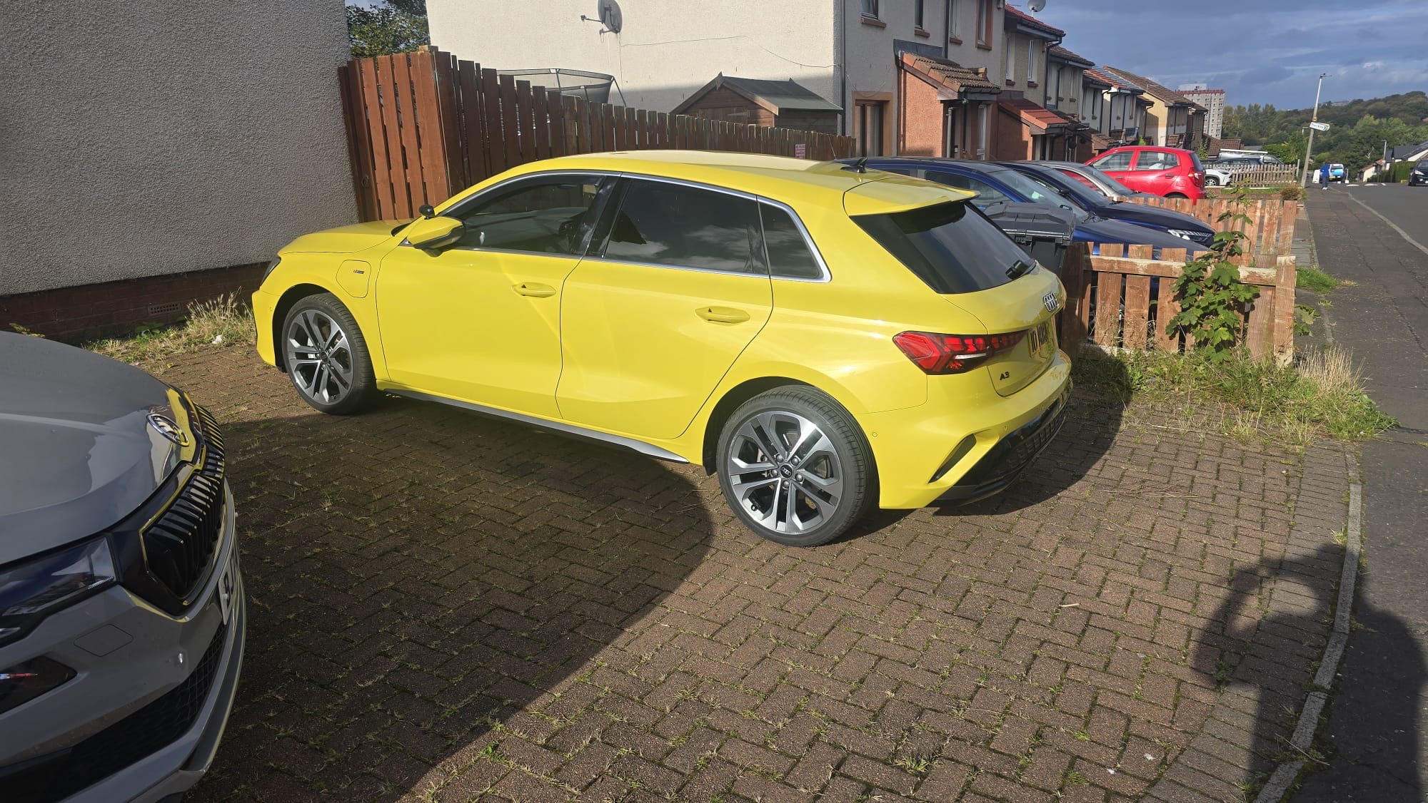 Yellow Audi A3 with restored nearside bodywork after repair